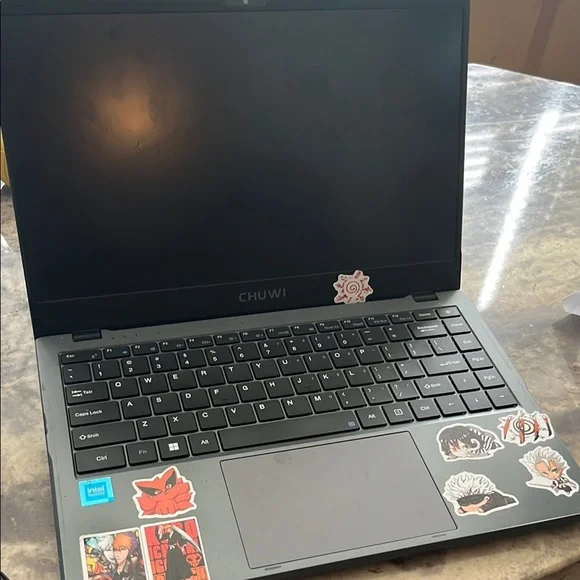 Gray Laptop with Stickers